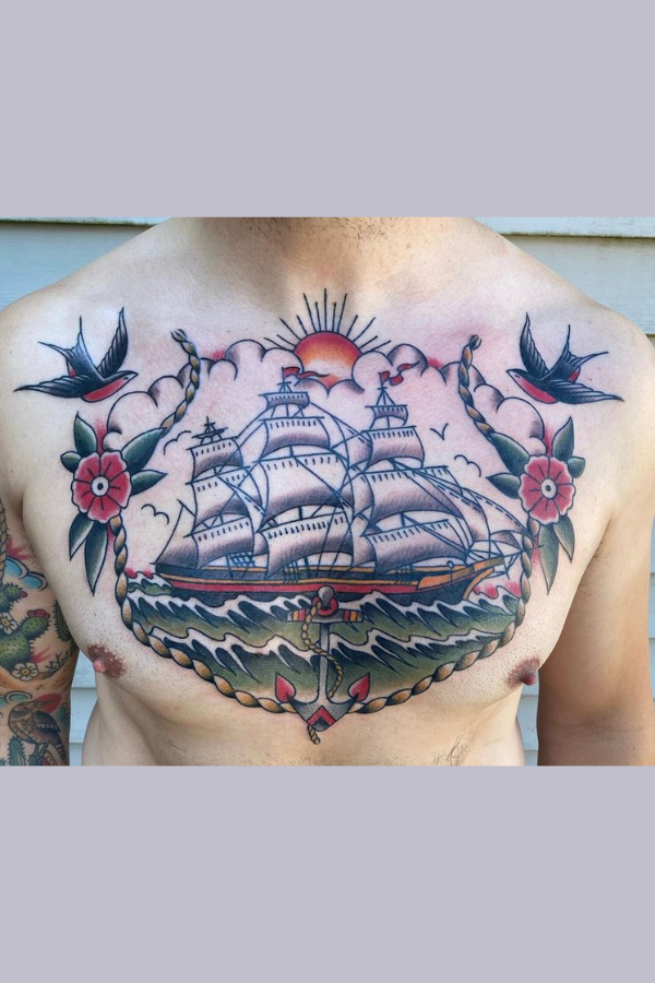 Ship chest piece tattoo framed in classic flowers and birds Eagle chest by Honest John of Highmark Tattoo Studio, Lynnwood, WA.
