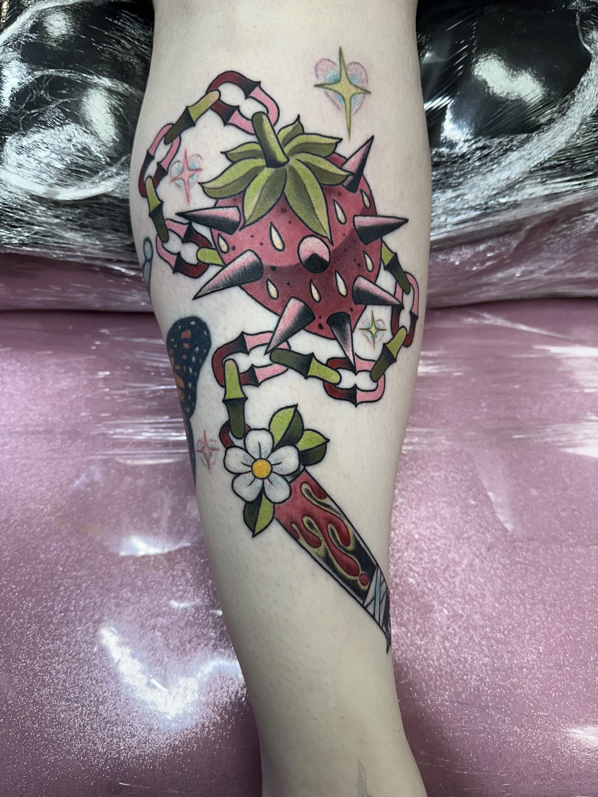 Blue whale with grey surf background tattoo by John Fitzgerald of Highmark Tattoo Studio in Lynnwood, WA.