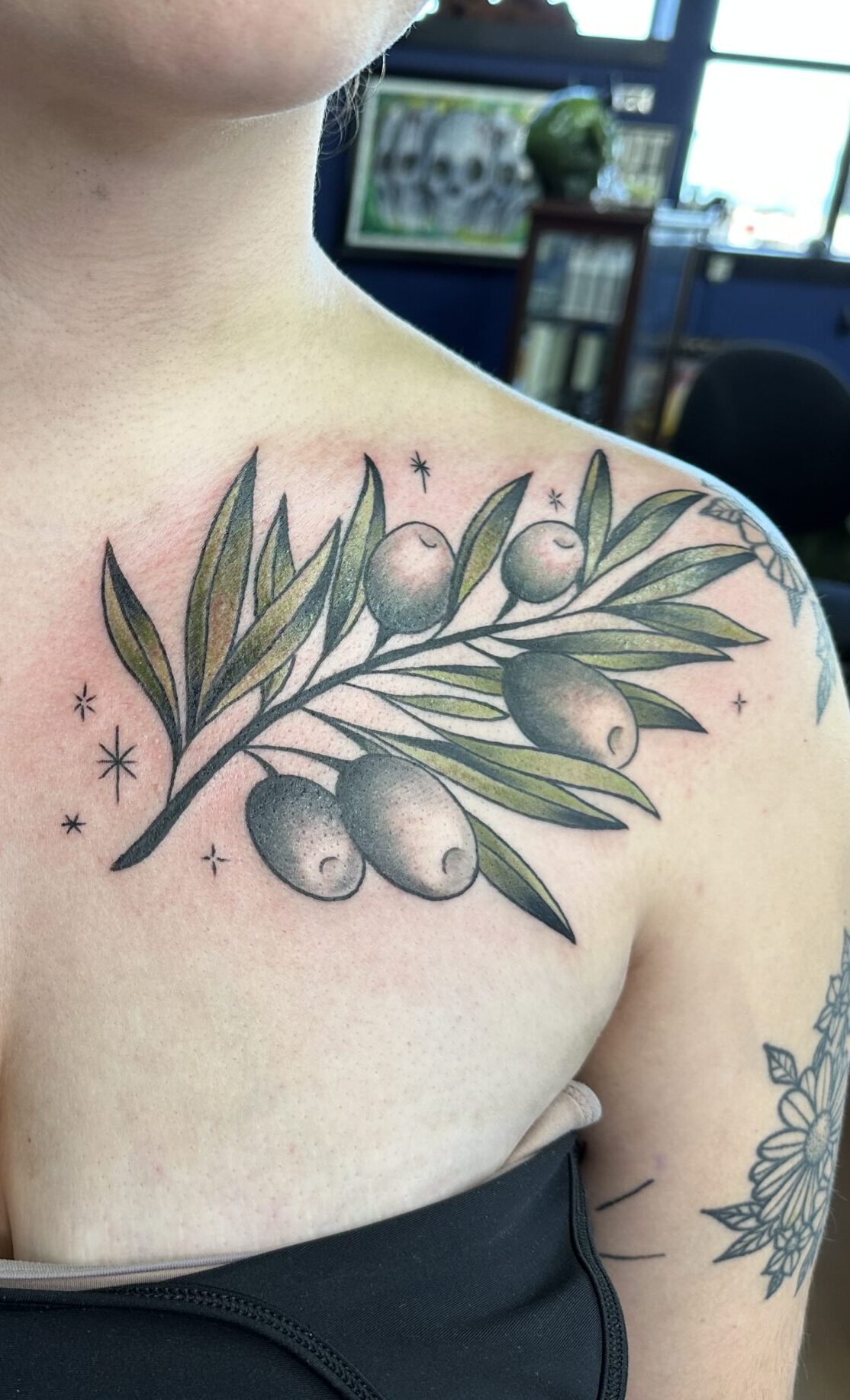 Blue whale with grey surf background tattoo by John Fitzgerald of Highmark Tattoo Studio in Lynnwood, WA.