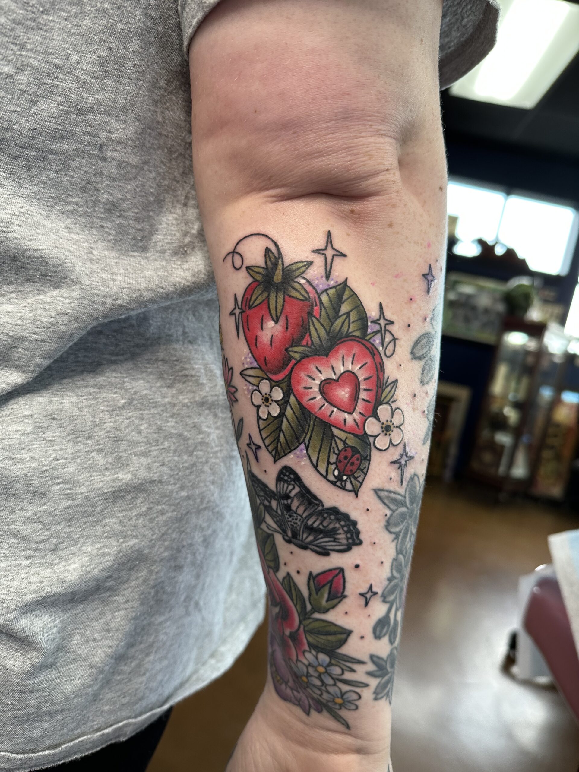 Colorul water and mountains scene contained witin a elephant head frame  from Highmark Tattoo Studio in Lynnwood, WA