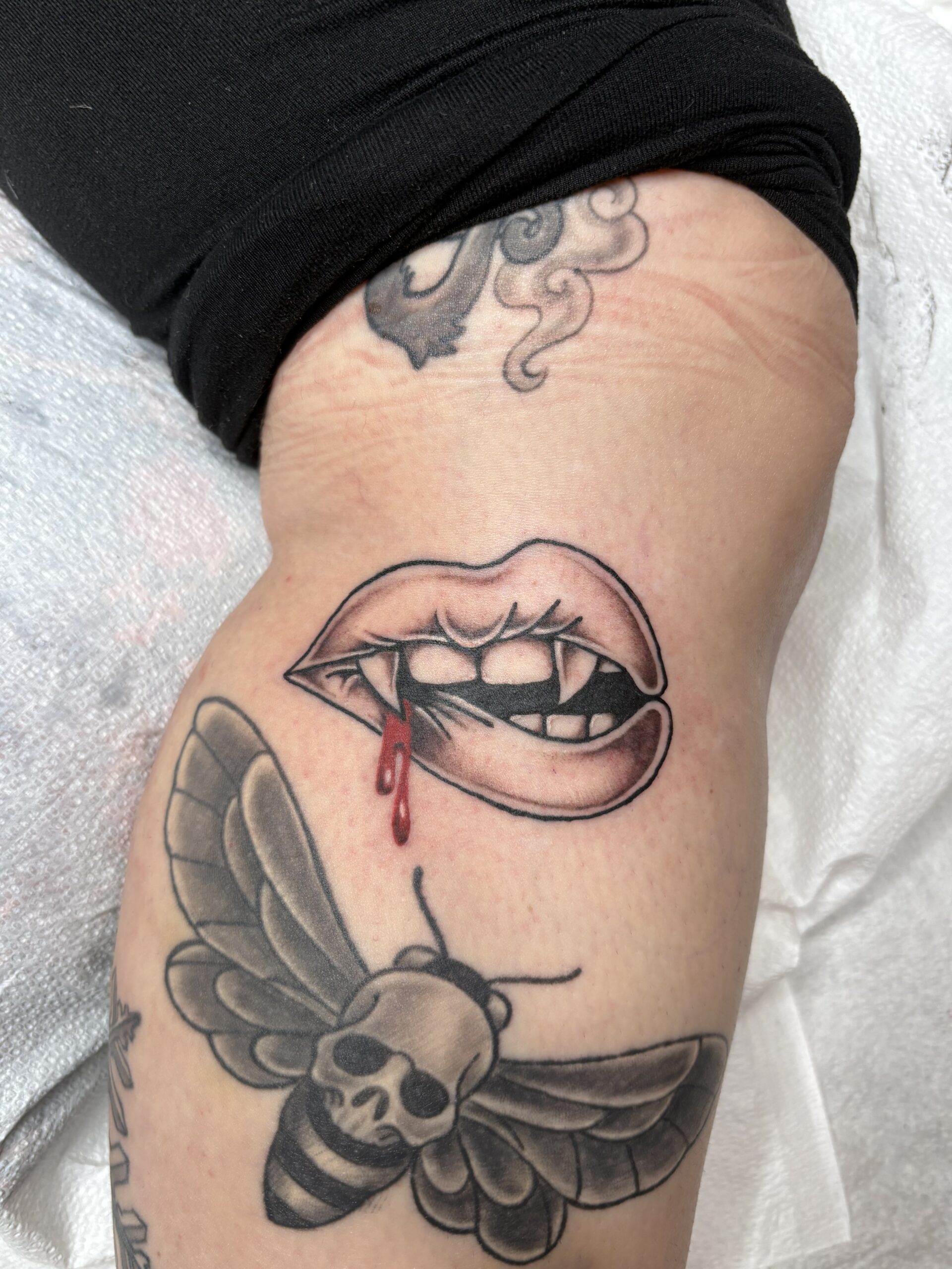 Flying eye tattoo tattoo available during Flash Tattoo events at Highmark Tattoo in Lynnwood, WA